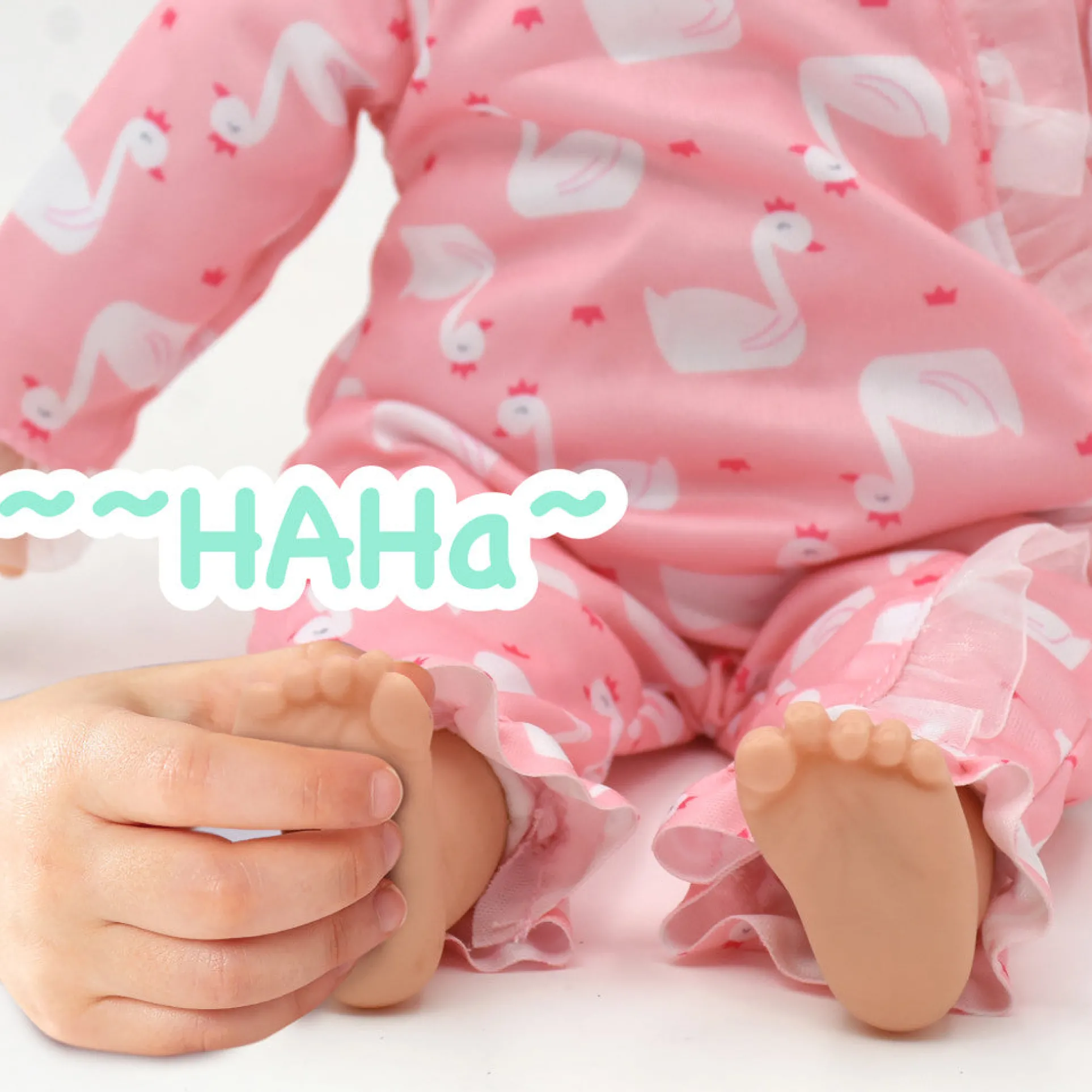 Little Darlings 14-inch Kiss N Tickles Baby Doll - Pink Swan Onesie